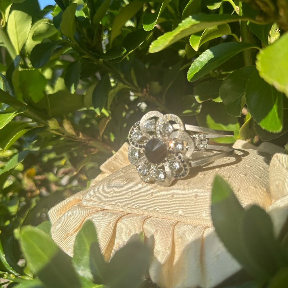Elegant Silver Flower Bracelet with Black and Clear Stones